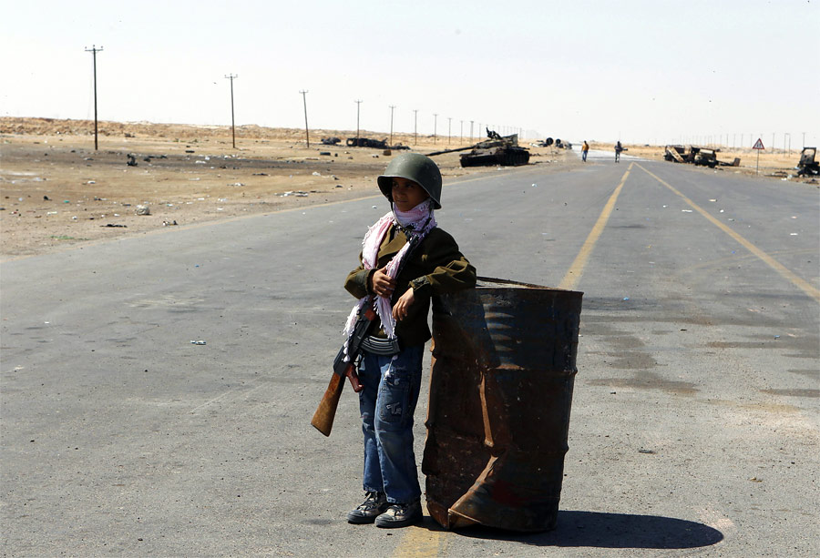 Юный ливийский повстанец. © Yannis Behrakis/Reuters