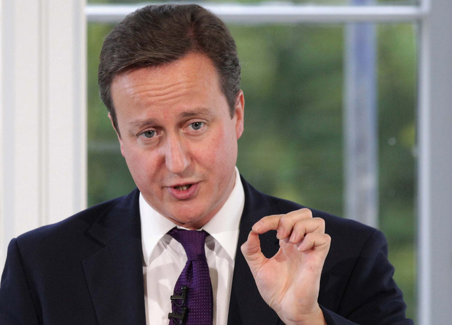 Премьер-министр Англии Дэвид Кэмэрон выступает с речью по вопросам иммиграции в Лондоне. © Pool/Oli Scarff/Reuters
