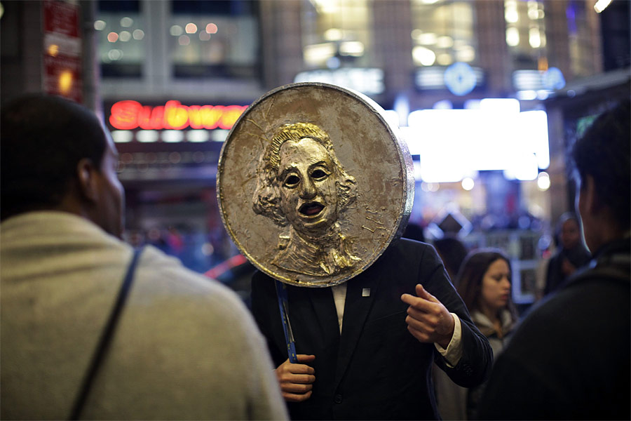 Демонстранты на Таймс-Сквер в Нью-Йорке. © Eduardo Munoz/Reuters