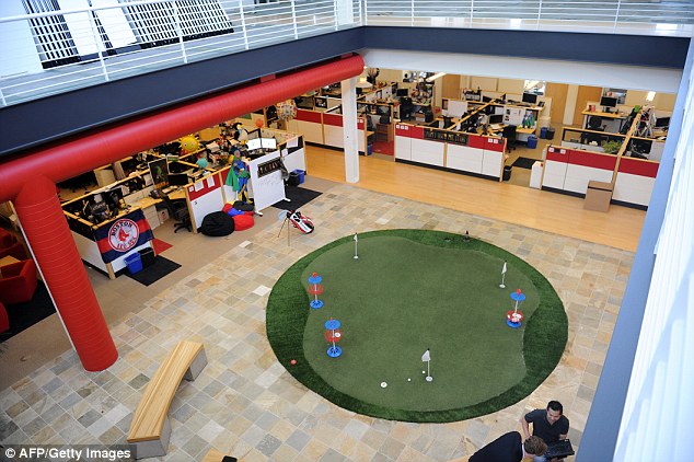 Work and play: The open plan office has bean bags, benches and a putting green 