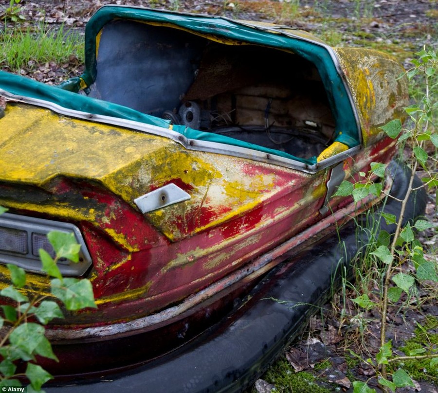 Broken dodgems lie rusting at the Pripyat Chernobyl Amusement Park