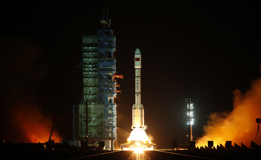 Старт первого модуля китайской космической станции. © PETAR KUJUNDZIC/Reuters