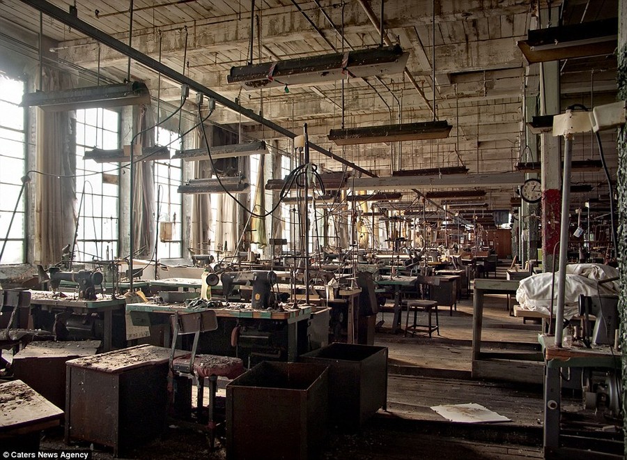 Where time stands still: An abandoned clothing factory still with all the machinery on tables as if it were left yesterday