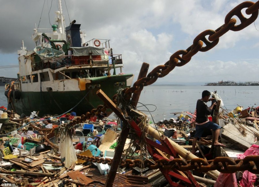 One survivor said the scenes of utter devastation caused by the typhoon was 'like the end of the world' 