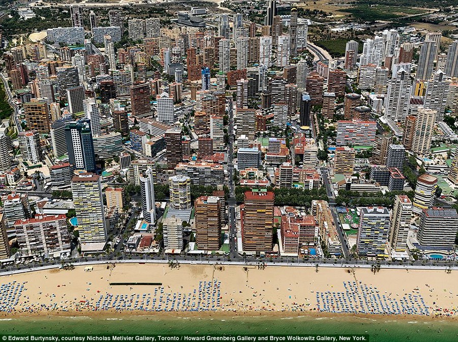 Attraction: High-rise hotels cluster next to the water in Benidorm, Spain
