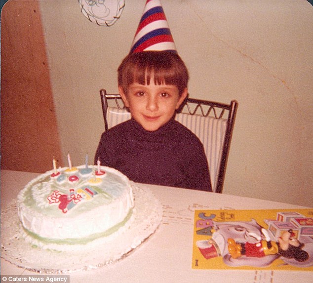 Cute: Charles pictured with his birthday cake on his fourth birthday 