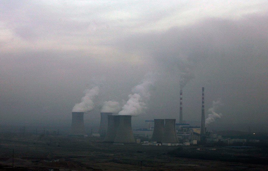 Угольные электростанции на окраине Ухай на севере Китая. © Jason Lee/Reuters