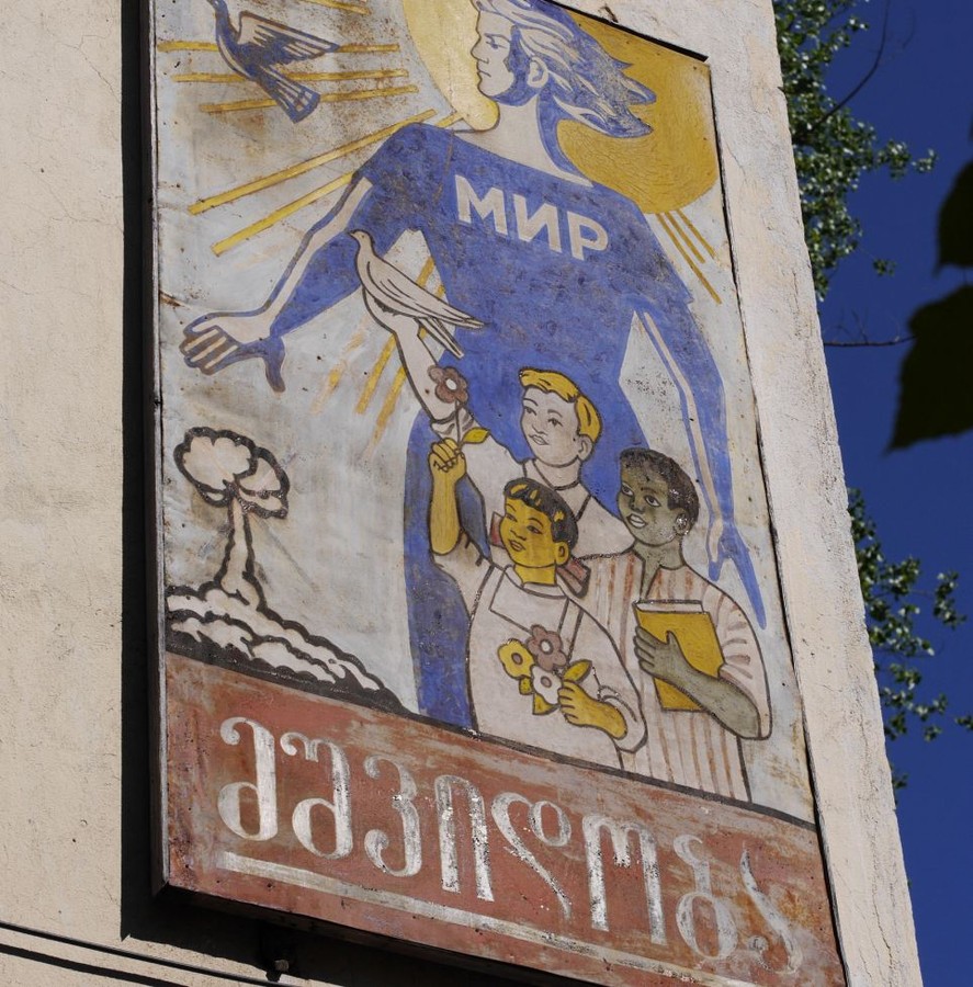 Soviet remnants: A cold war poster proclaiming 'Peace' in Russian and Georgian script hangs in the town