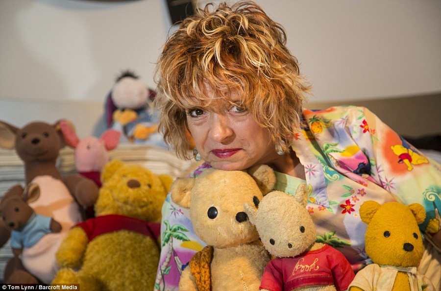 Dedicated: Deb Hoffmann, 48, is so in love with the cute children's book character that she has been buying anything associated with Winnie the Pooh for 20 years