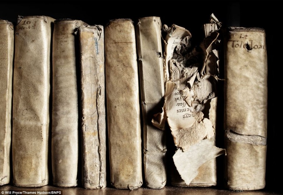 Knowledge is power: Bomb-damaged books now stored safely in the chapter library, Noyon Cathedral, France