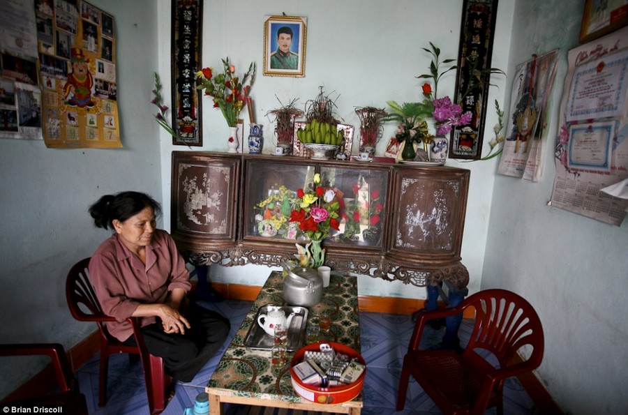 Family: A mother of an Agent Orange victim at home in Kim Dong district of Nhat Tan, Vietnam