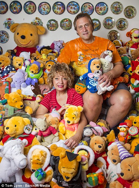 Supportive: Deb Hoffmann's husband Gary doesn't mind his wife's hobby so long as he doesn't get kicked out of bed to make room for more Winnie the Pooh collectibles 