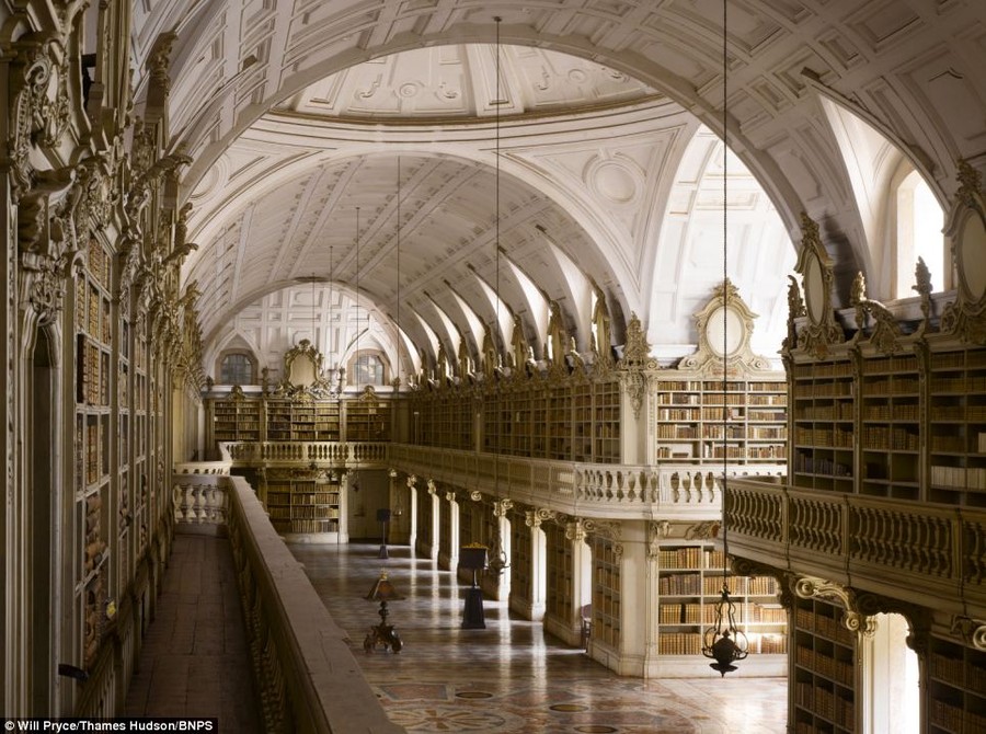 Quiet please: The grand surroundings of the Mafra Palace Library, in Mafra, Portugal is just one of the many libraries featured in Dr James Campbell's new book