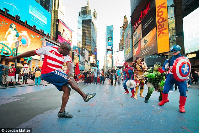 'Battle of the Superheroes': Retired Liberian soccer player Musa Shannon takes on a bevy of action heroes in Times Square