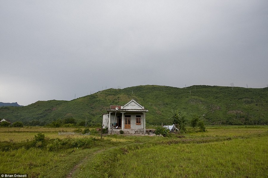 Bucolic setting: The house of Nguyen Pham, 11, an Agent Orange victim, in the district of Chi Linh, Vietnam