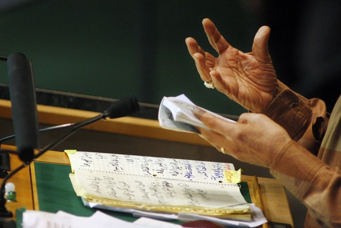 Руки Муаммара.