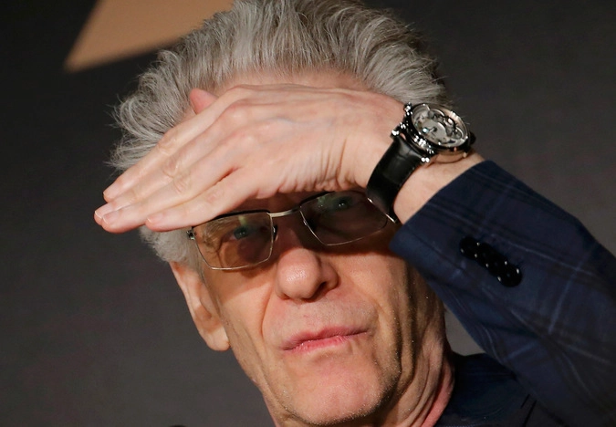 Режиссёр Дэвид Кроненберг.