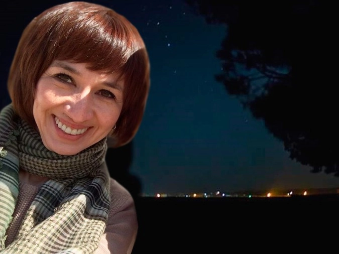 Шахида Якуб. В отдалении - лагерь ИГ.