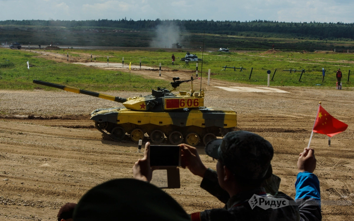 Китайцы болеют за своих Китайцы болеют за своих