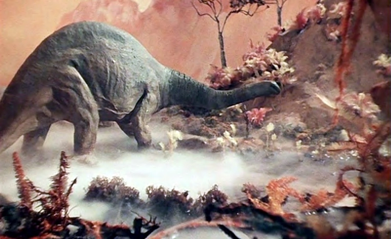 Динозавр на Венере. Кадр научно-фантастического кинофильма «Планета бурь» (1961), снятого П. Клушанцевым по одноимённой повести А. Казанцева (1959). Иллюстрация из книги П. Шубина «Венера. Неукротимая планета» (2017) Динозавр на Венере. Кадр научно-фантастического кинофильма «Планета бурь» (1961), снятого П. Клушанцевым по одноимённой повести А. Казанцева (1959). Иллюстрация из книги П. Шубина «Венера. Неукротимая планета» (2017)