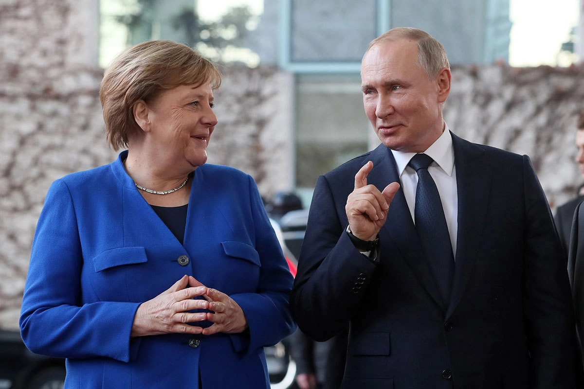 Канцлер Германии Ангела Меркель и президент России Владимир Путин © EPA/ТАСС