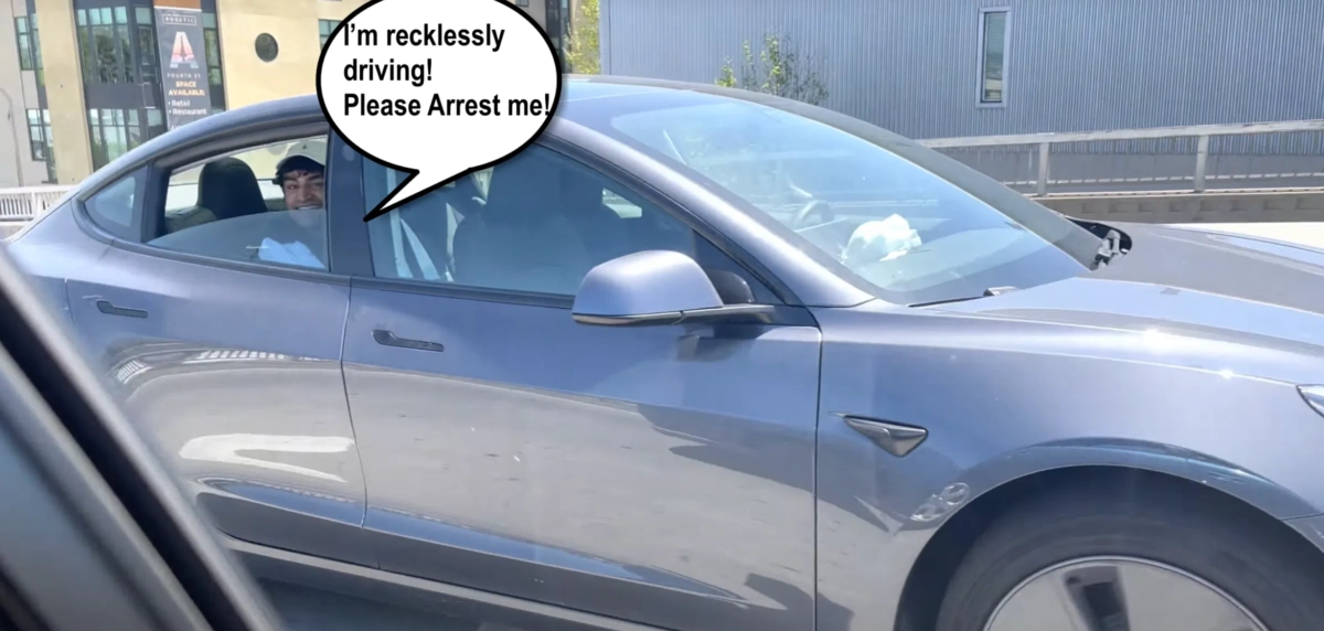 Мужчина управляет авто с заднего сидения. Мужчина управляет авто с заднего сидения.