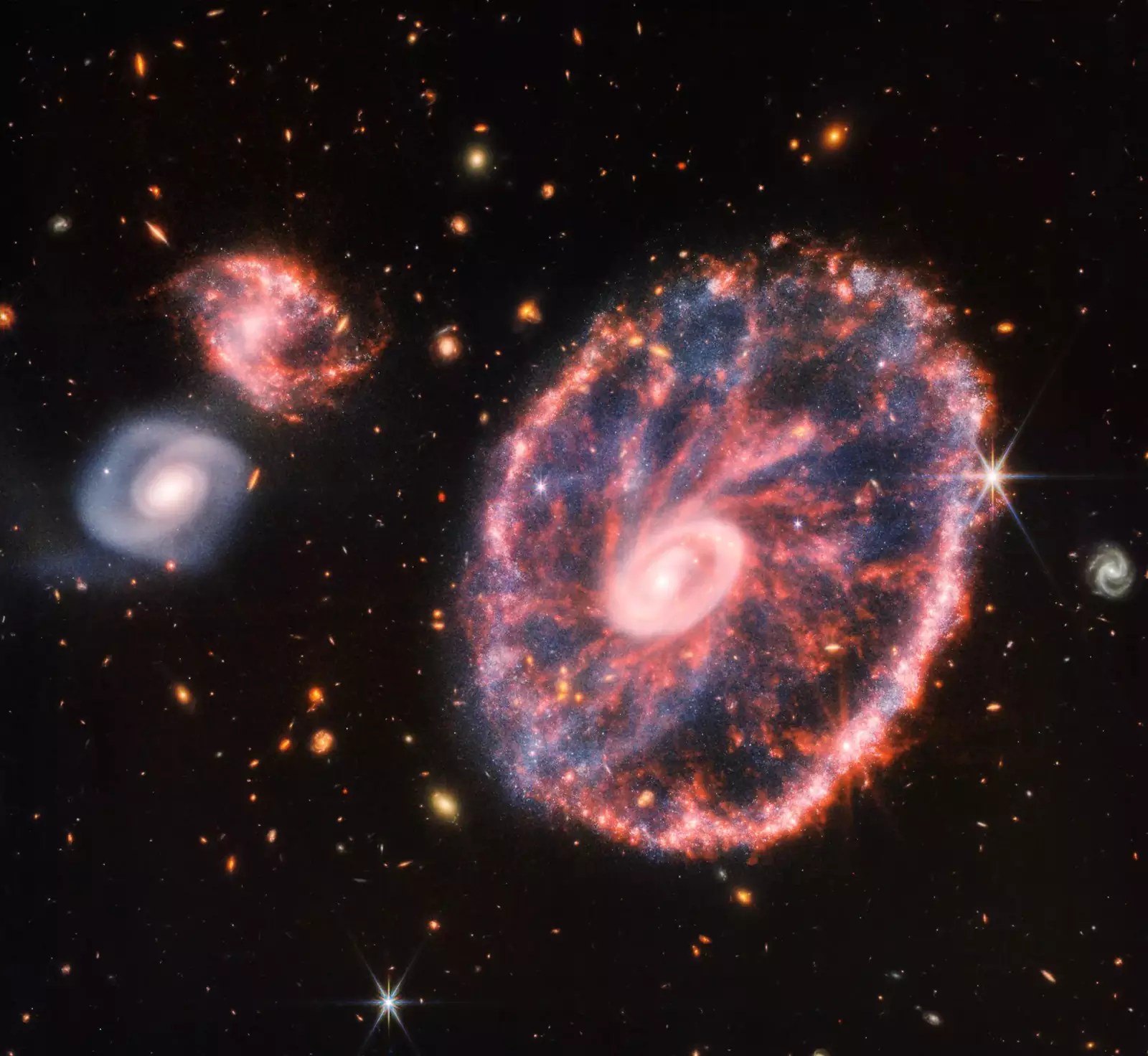 Космический телескоп «Джеймс Уэбб» сделал потрясающий новый снимок галактики «Колесо Телеги».