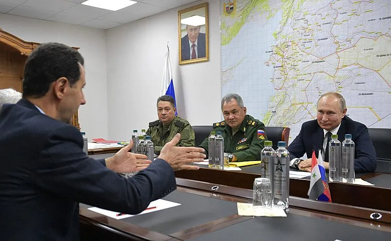 Генерал Чайко (второй слева) с Башаром Асадом, Сергеем Шойгу и Владимиром Путиным.